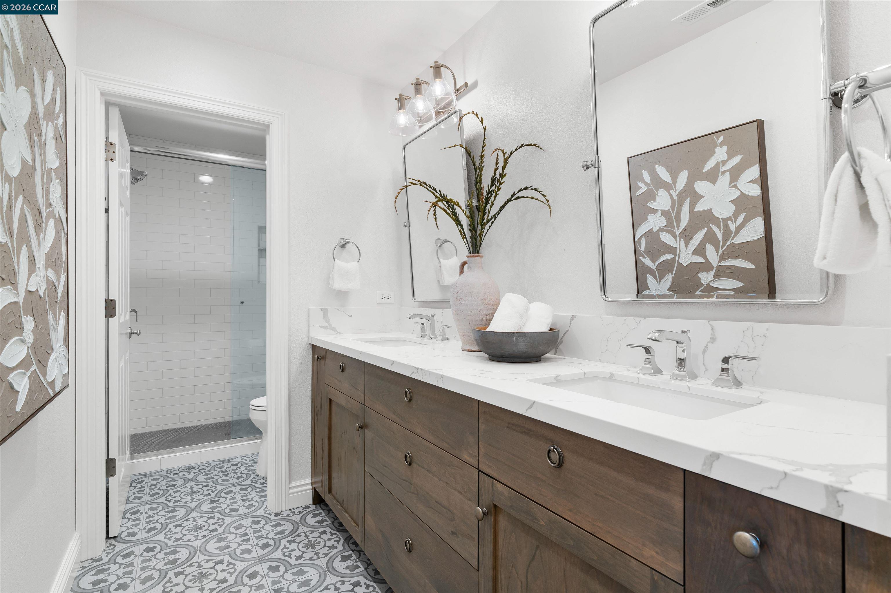 138 Sunhaven Road Danville, CA 94506 - Photo 41 of 60 a bathroom with a double vanity sink mirror and shower