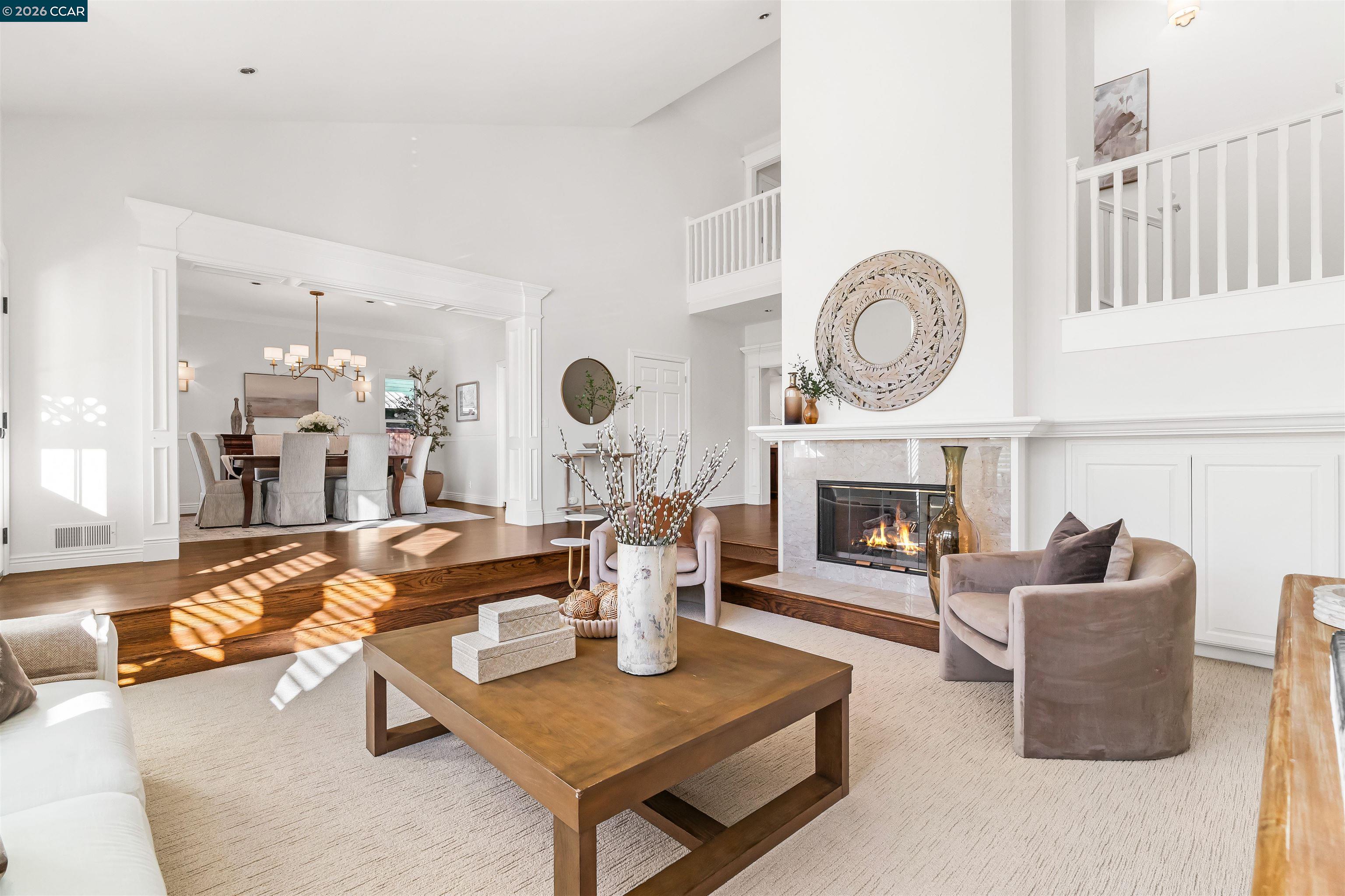 138 Sunhaven Road Danville, CA 94506 - Photo 5 of 60 a living room with furniture a fireplace and a large window