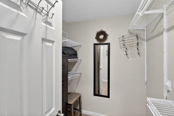 a view of a hallway with workspace