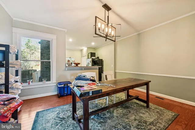 a view of a workspace with furniture