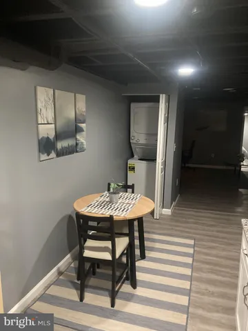 a kitchen with a stove and a refrigerator