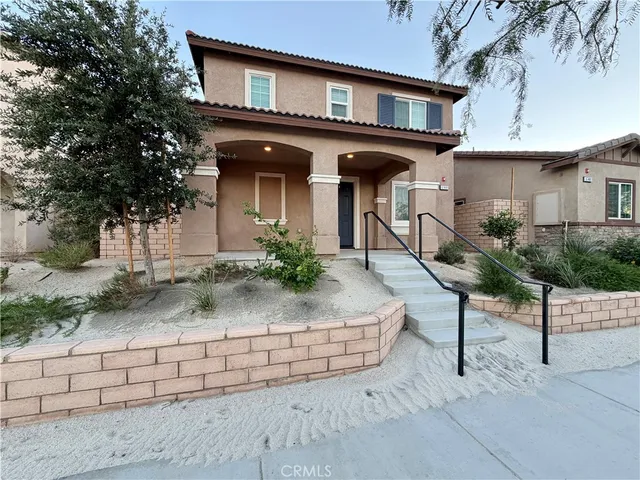 a house view with a outdoor space