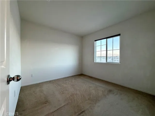a bathroom with a double vanity sink toilet mirror and bathtub