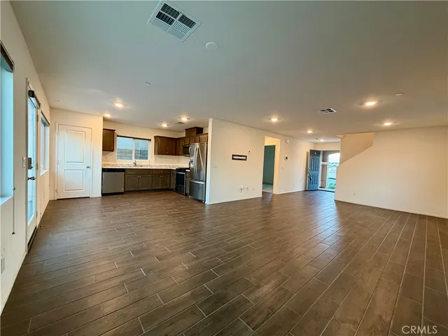 a view of kitchen and a window with kitchen