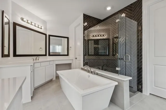 a bathroom with a sink a mirror and a toilet