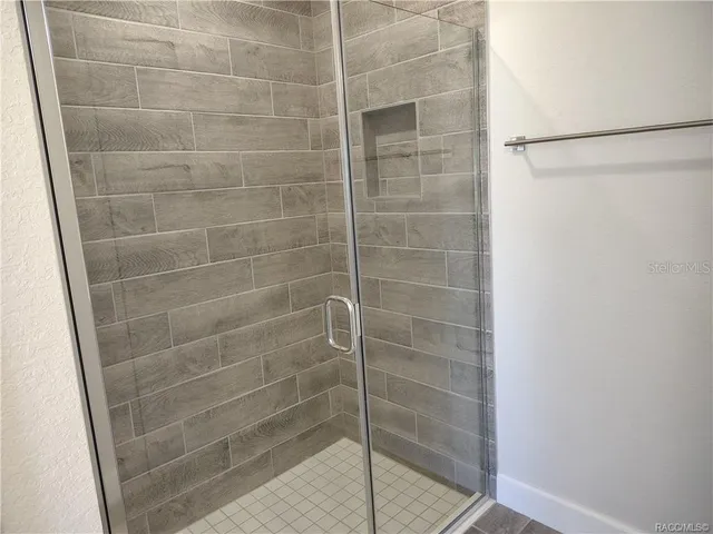 a view of a room with racks on the wall