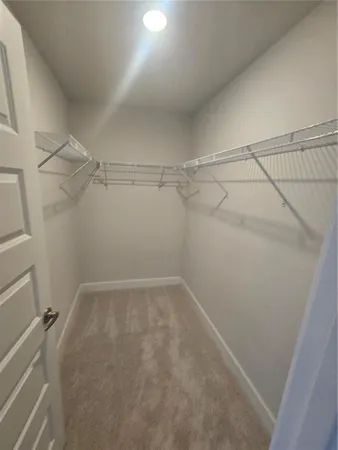 a bathroom with a double vanity sink and mirror