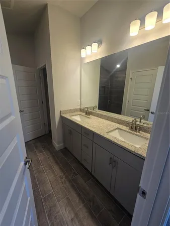 a bathroom with a shower and toilet