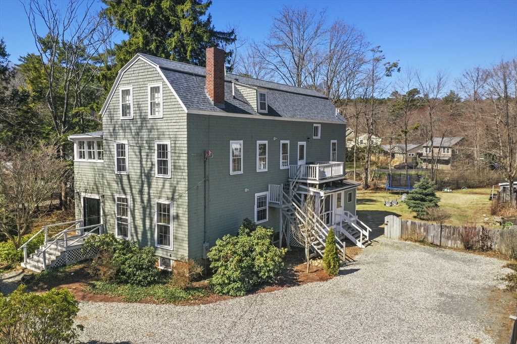 40 Haskell Street Beverly, MA 01915 - Photo 1 of 38 a view of a house with a yard and potted plants