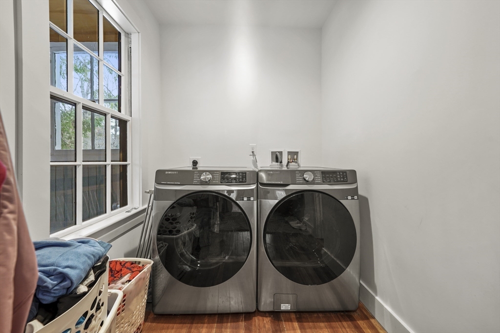 40 Haskell Street Beverly, MA 01915 - Photo 16 of 38 a utility room with dryer and washer