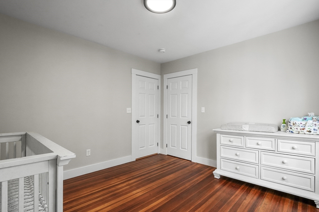 40 Haskell Street Beverly, MA 01915 - Photo 21 of 38 a view of a room with wooden floor and cabinet