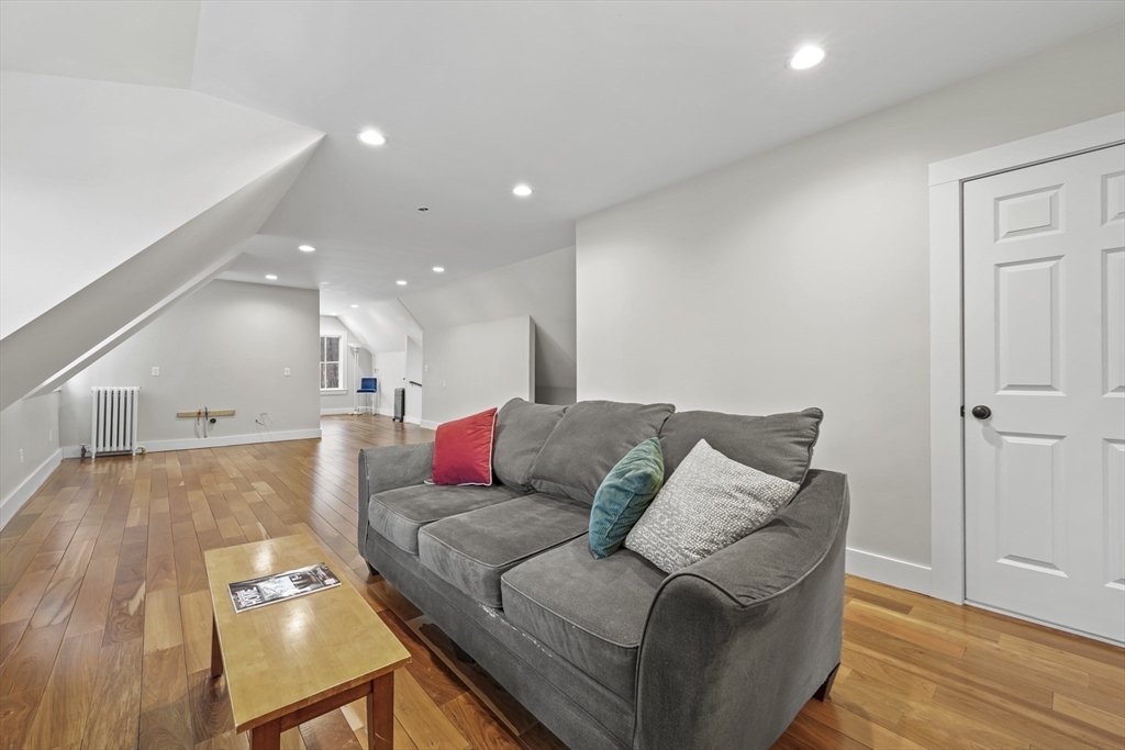 40 Haskell Street Beverly, MA 01915 - Photo 29 of 38 a living room with furniture and a wooden floor