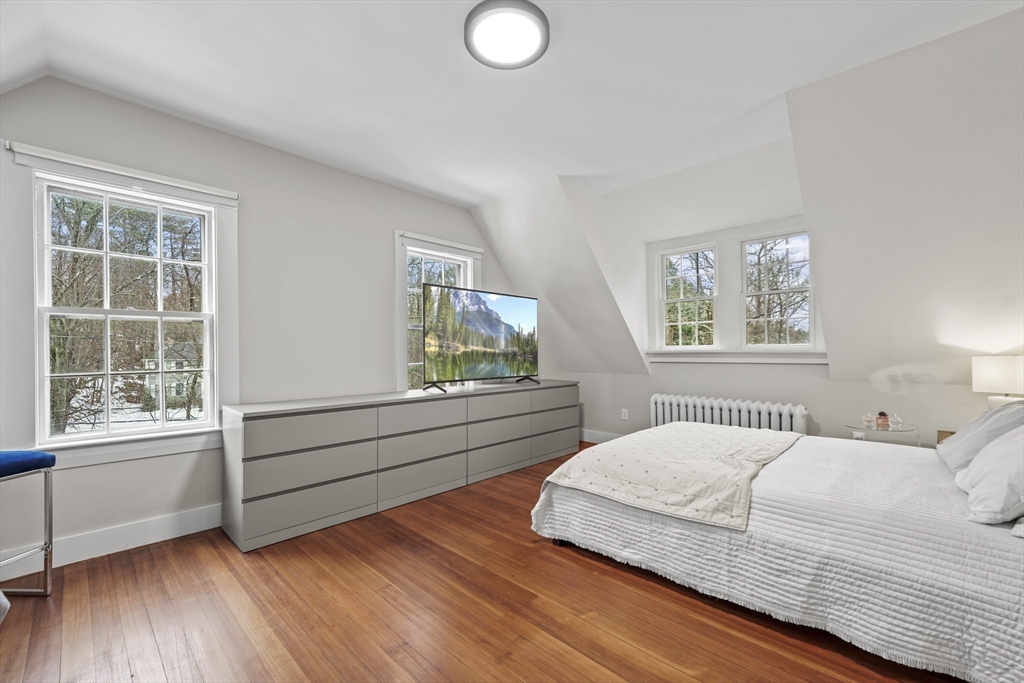 40 Haskell Street Beverly, MA 01915 - Photo 30 of 38 a bedroom with a bed and a window