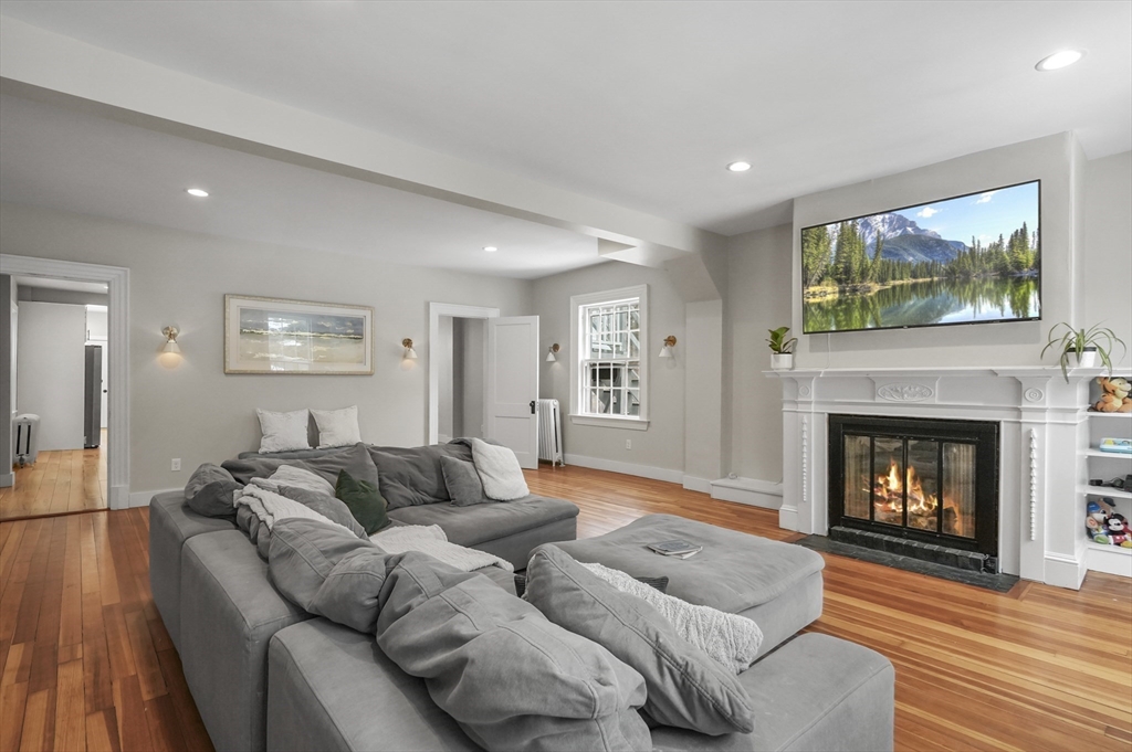 40 Haskell Street Beverly, MA 01915 - Photo 3 of 38 a living room with furniture and a fireplace