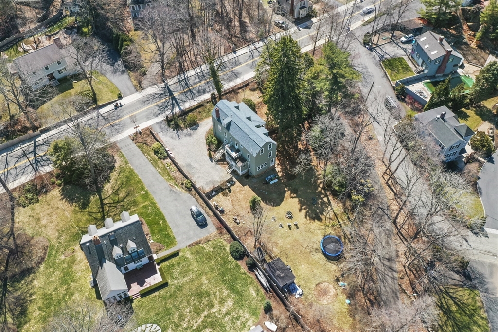 40 Haskell Street Beverly, MA 01915 - Photo 36 of 38 an aerial view of a house with a yard and lake view
