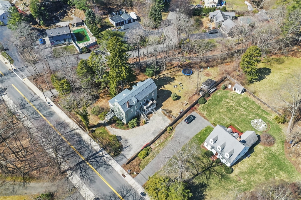 40 Haskell Street Beverly, MA 01915 - Photo 37 of 38 an aerial view of a house with a yard and lake view