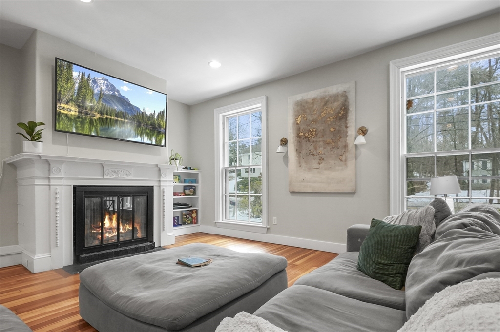 40 Haskell Street Beverly, MA 01915 - Photo 4 of 38 a living room with furniture and a fireplace