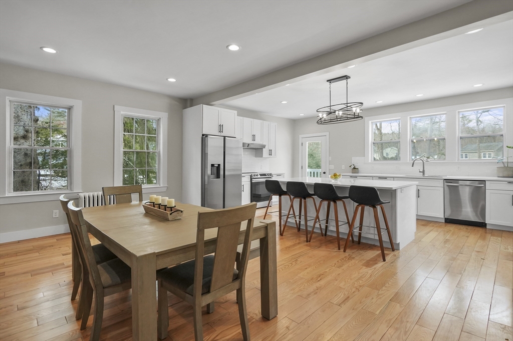 40 Haskell Street Beverly, MA 01915 - Photo 6 of 38 a kitchen with a table and chairs