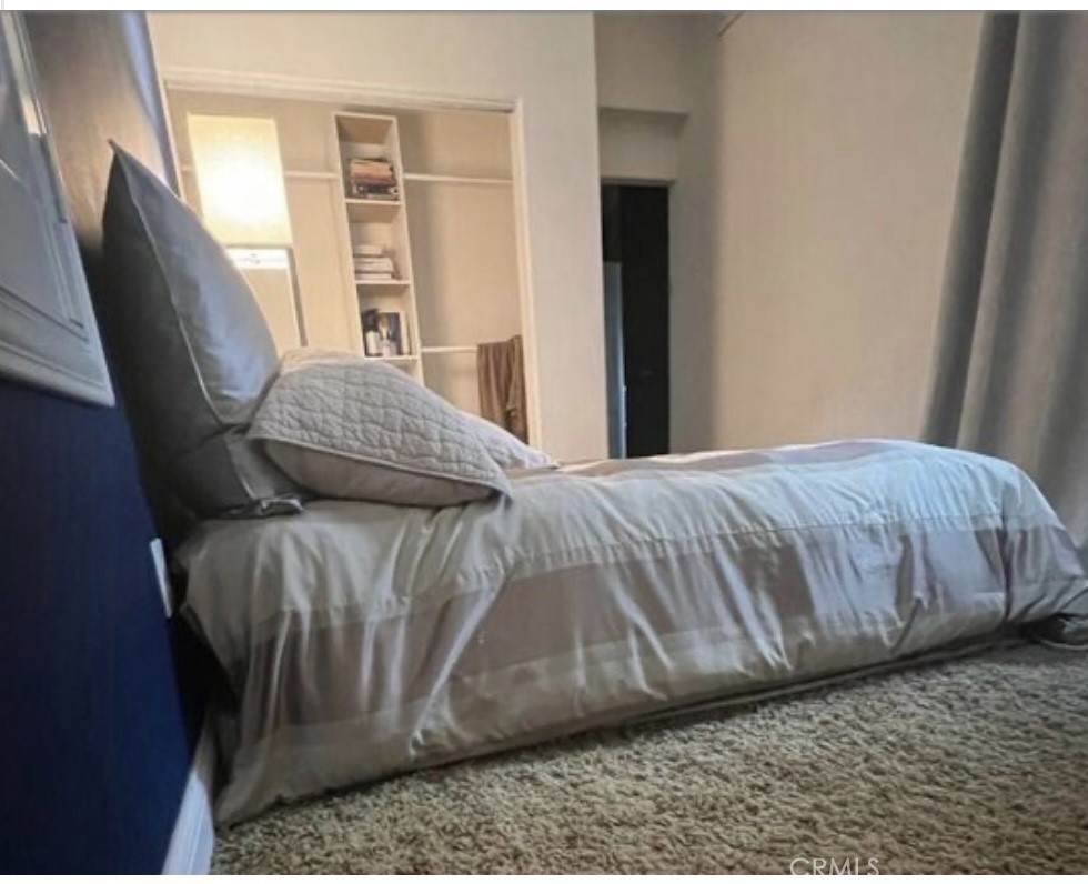 11105 Means Tustin, CA 92782 - Photo 15 of 23 a bedroom with a bed and wooden floor