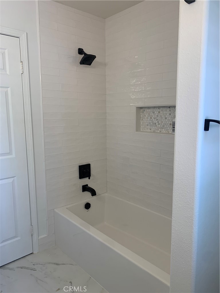 11105 Means Tustin, CA 92782 - Photo 16 of 23 a bathroom with a bathtub
