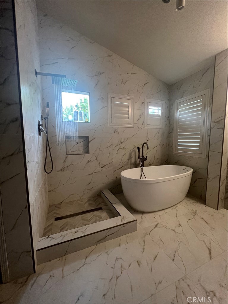 11105 Means Tustin, CA 92782 - Photo 19 of 23 a view of a livingroom with furniture and windows