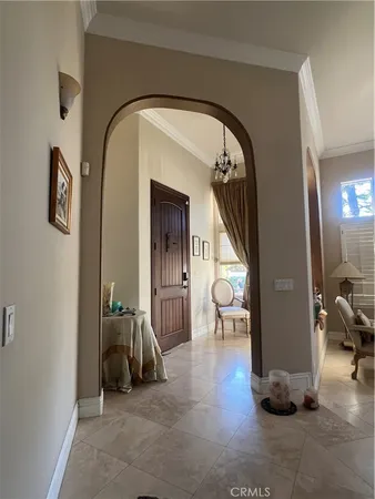 a view of livingroom with furniture and entryway