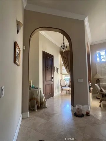 a view of livingroom with furniture and entryway