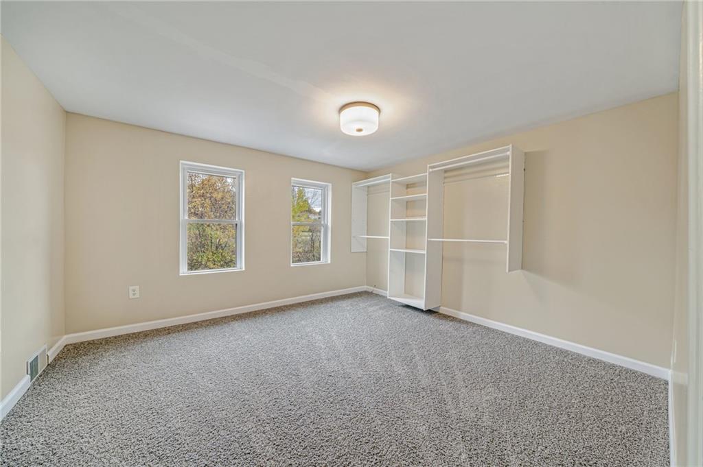 1109 Baggaley Avenue Latrobe, PA 15650 - Photo 18 of 36 an empty room with windows