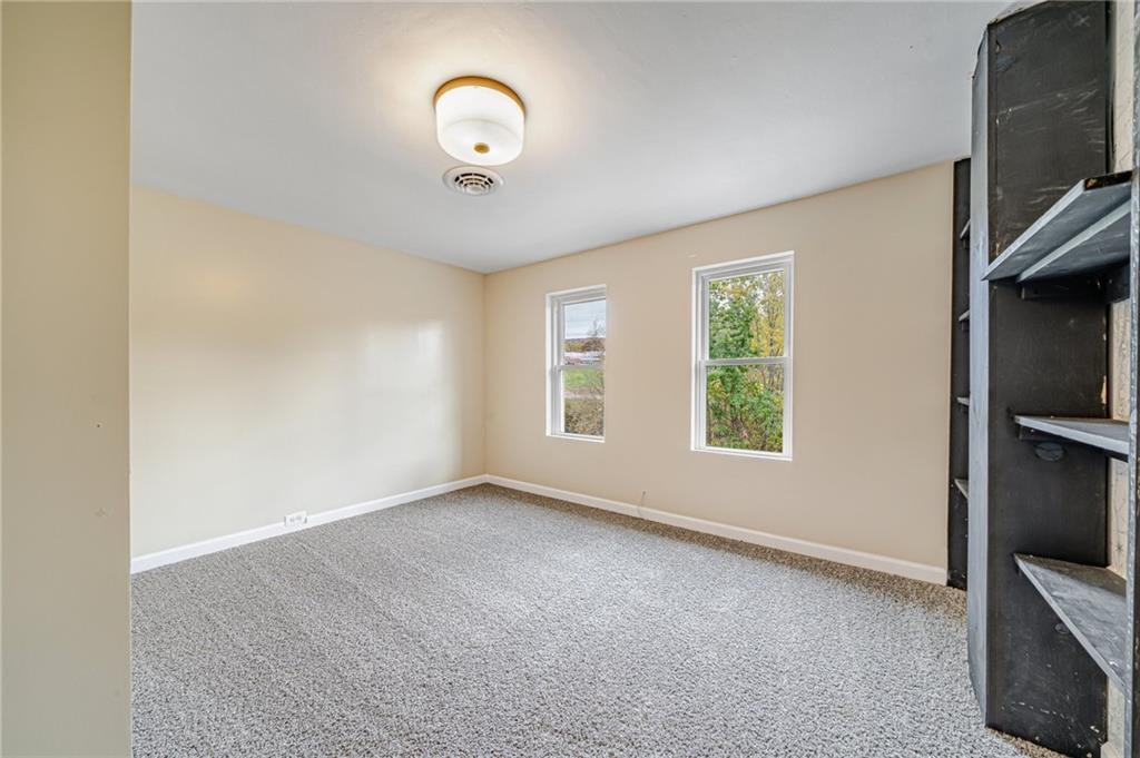 1109 Baggaley Avenue Latrobe, PA 15650 - Photo 23 of 36 an empty room with windows