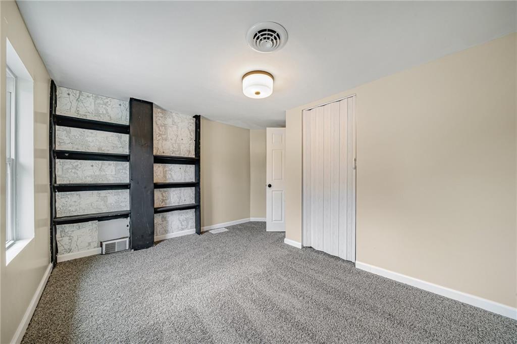 1109 Baggaley Avenue Latrobe, PA 15650 - Photo 24 of 36 a view of an empty room with a window