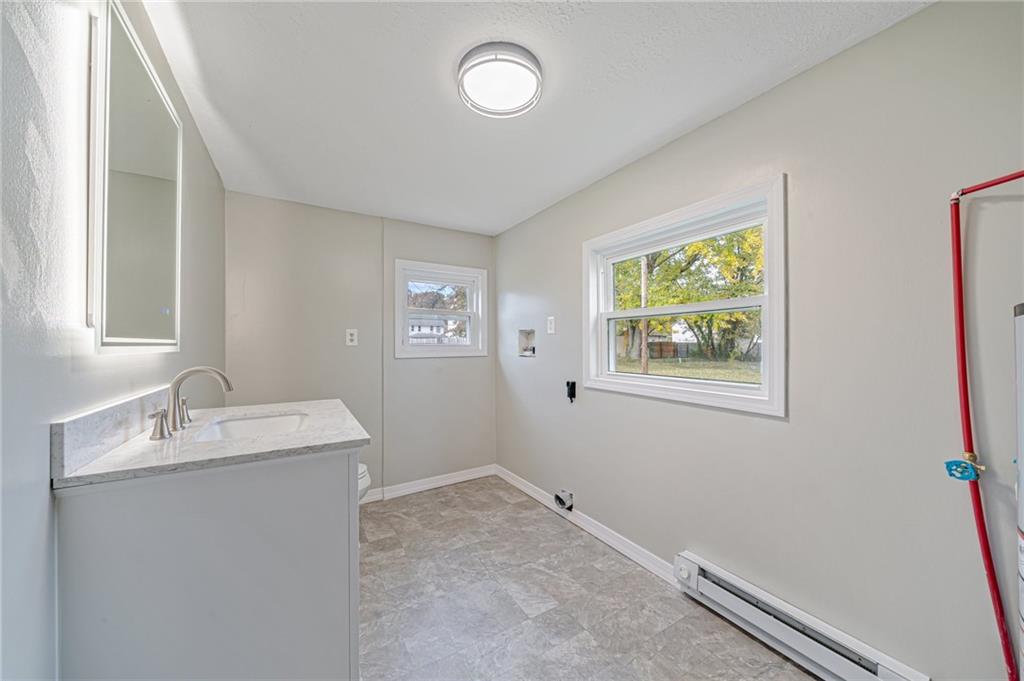 1109 Baggaley Avenue Latrobe, PA 15650 - Photo 28 of 36 a bathroom with a sink and a mirror