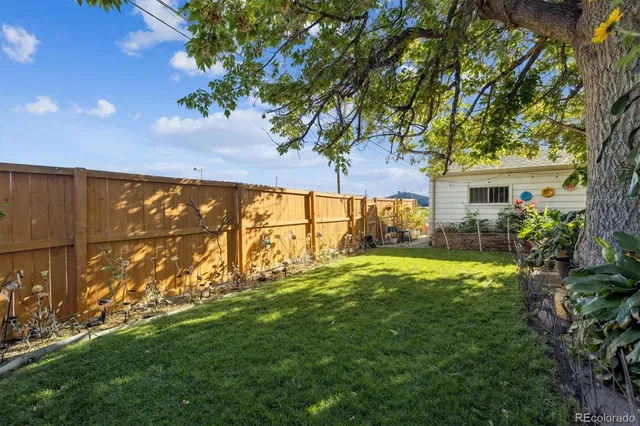 a house with garden in front of it