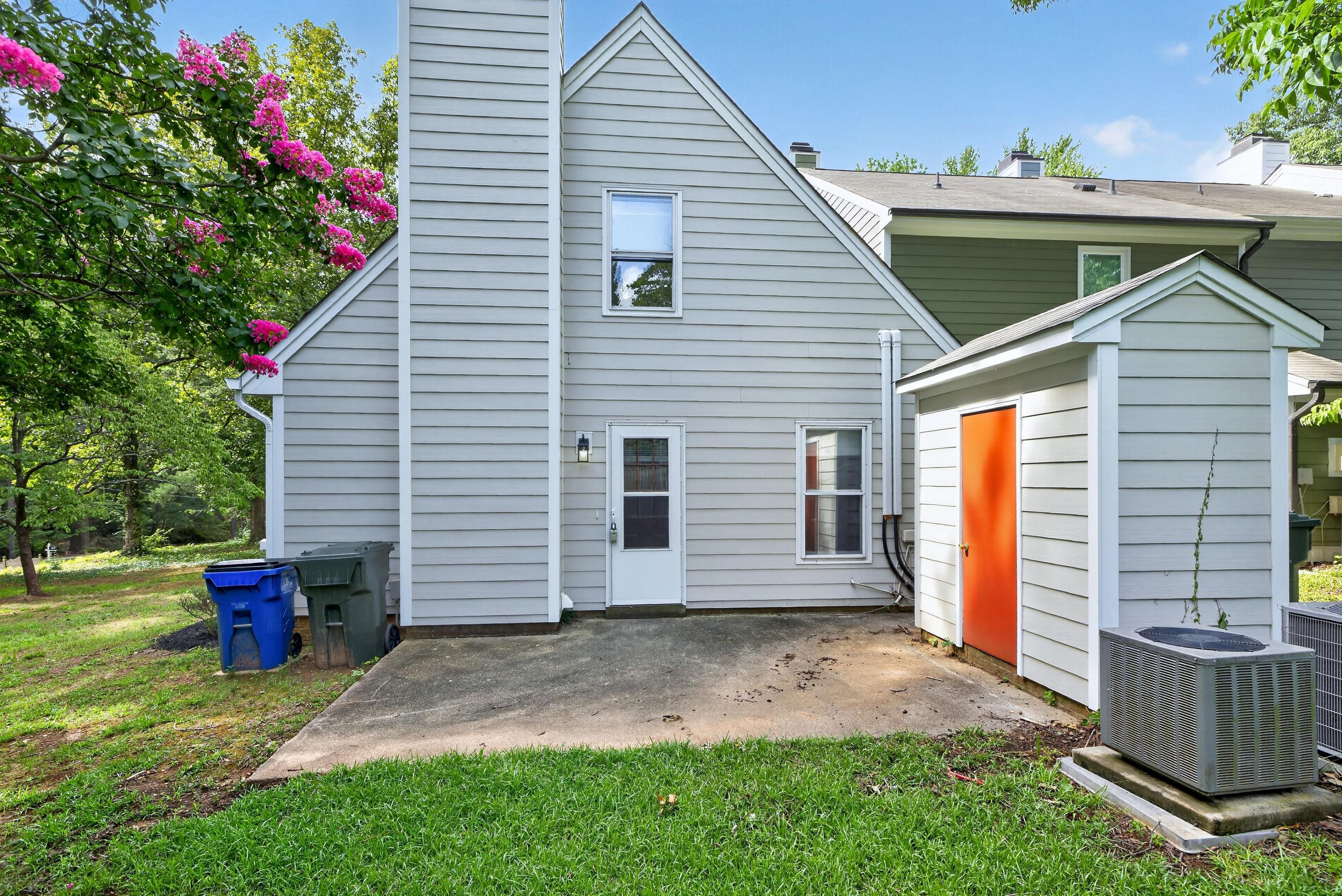 708 Powell Drive, Unit A Raleigh, NC 27606 - Photo 43 of 56 Back Patio and storage area
