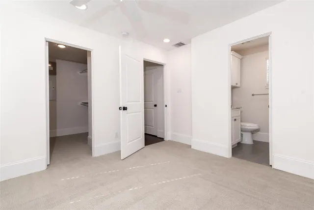 a view of a bathroom with a toilet