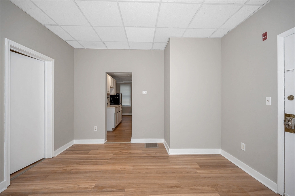 90 Appleton Street, Unit U:7 Lowell, MA 01852 - Photo 11 of 13 a view of a hallway with wooden floor