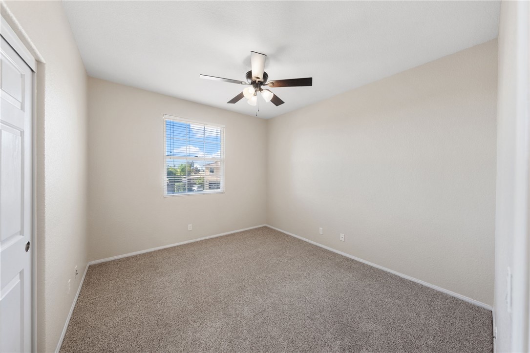 31465 Inverness Court Temecula, CA 92591 - Photo 49 of 75 Bright and inviting bedroom 4 features a well proportional layout and convenient closet space.