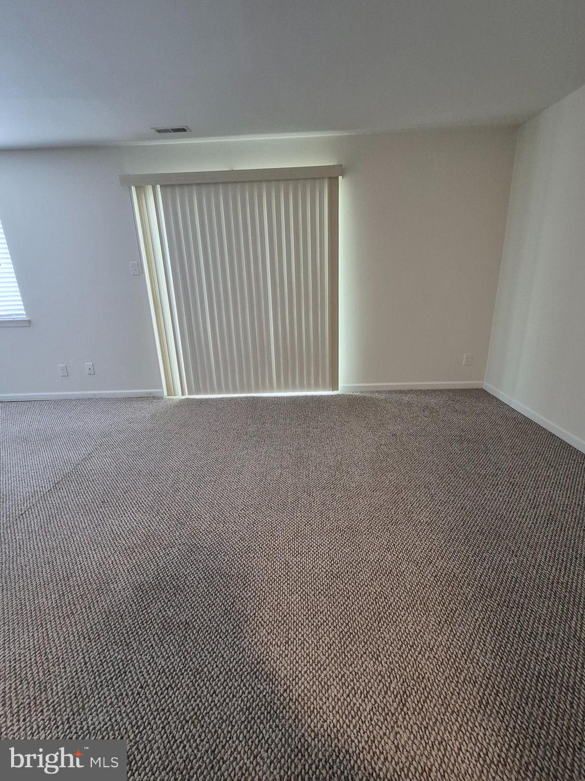 17 Sandra Road Voorhees, NJ 08043 - Photo 5 of 14 an empty room with windows