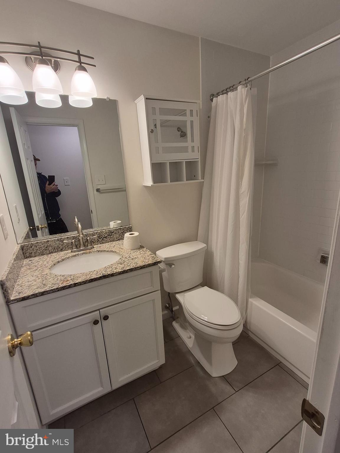17 Sandra Road Voorhees, NJ 08043 - Photo 8 of 14 a bathroom with a granite countertop sink toilet and shower