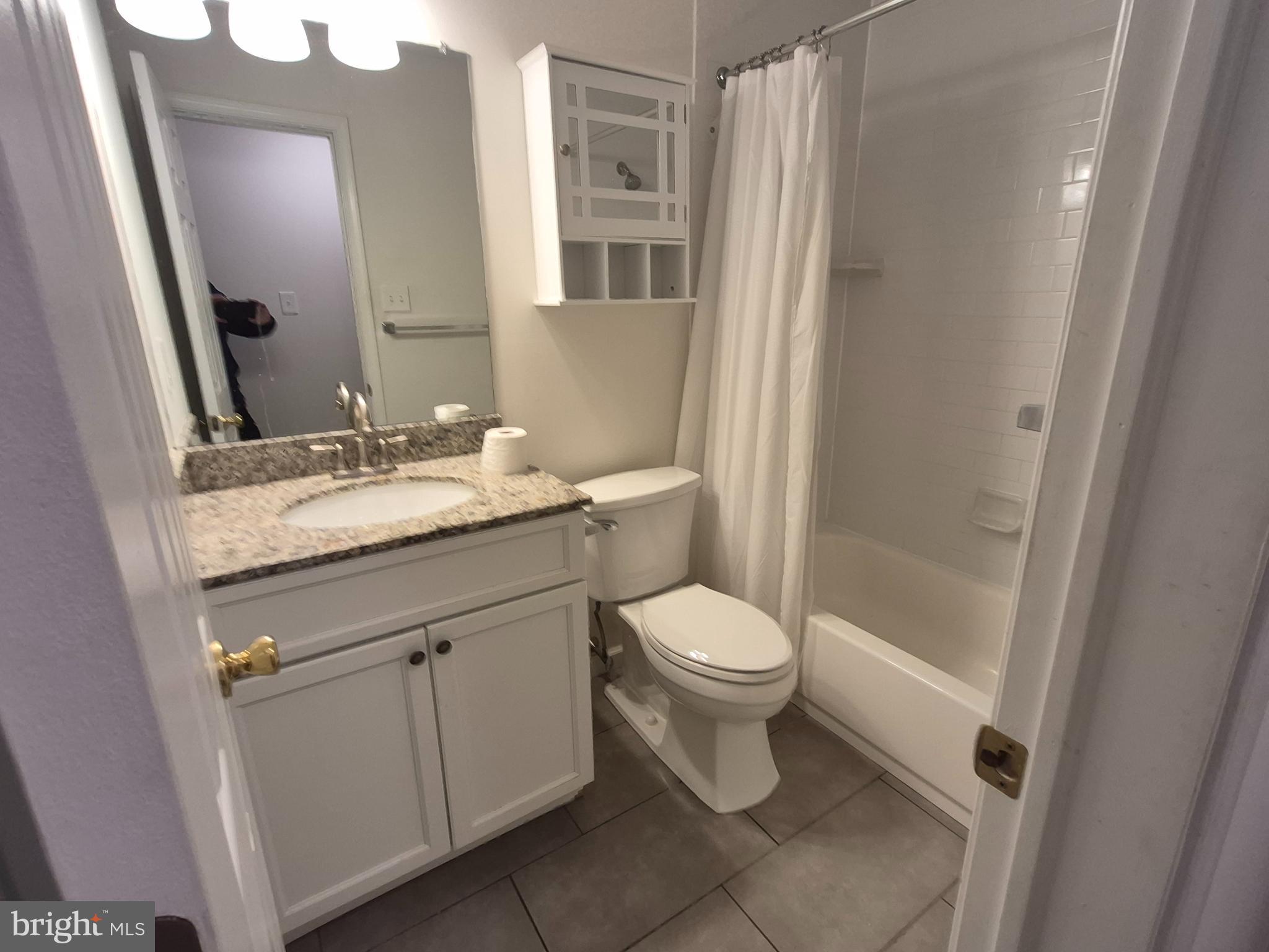 17 Sandra Road Voorhees, NJ 08043 - Photo 9 of 14 a bathroom with a granite countertop sink toilet and shower