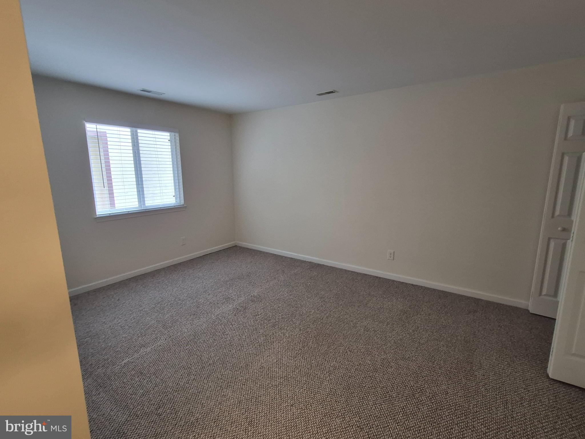 17 Sandra Road Voorhees, NJ 08043 - Photo 10 of 14 an empty room with a window