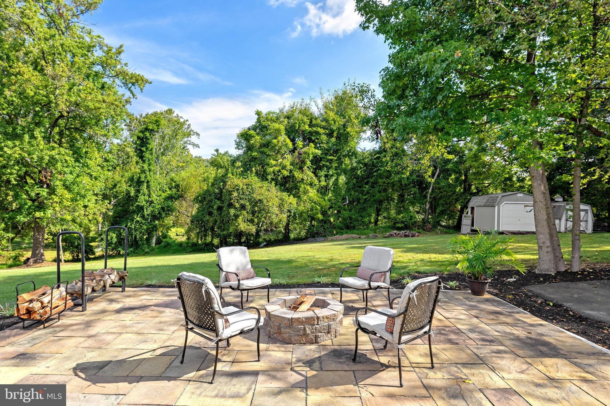 11410 Waples Mill Road Oakton, VA 22124 - Photo 54 of 62 Serene patio retreat with fire pit