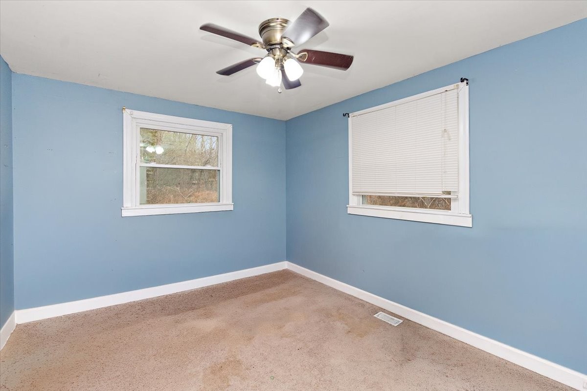 1081 Slaters Creek Road Goodlettsville, TN 37072 - Photo 11 of 22 a view of an empty room with a window