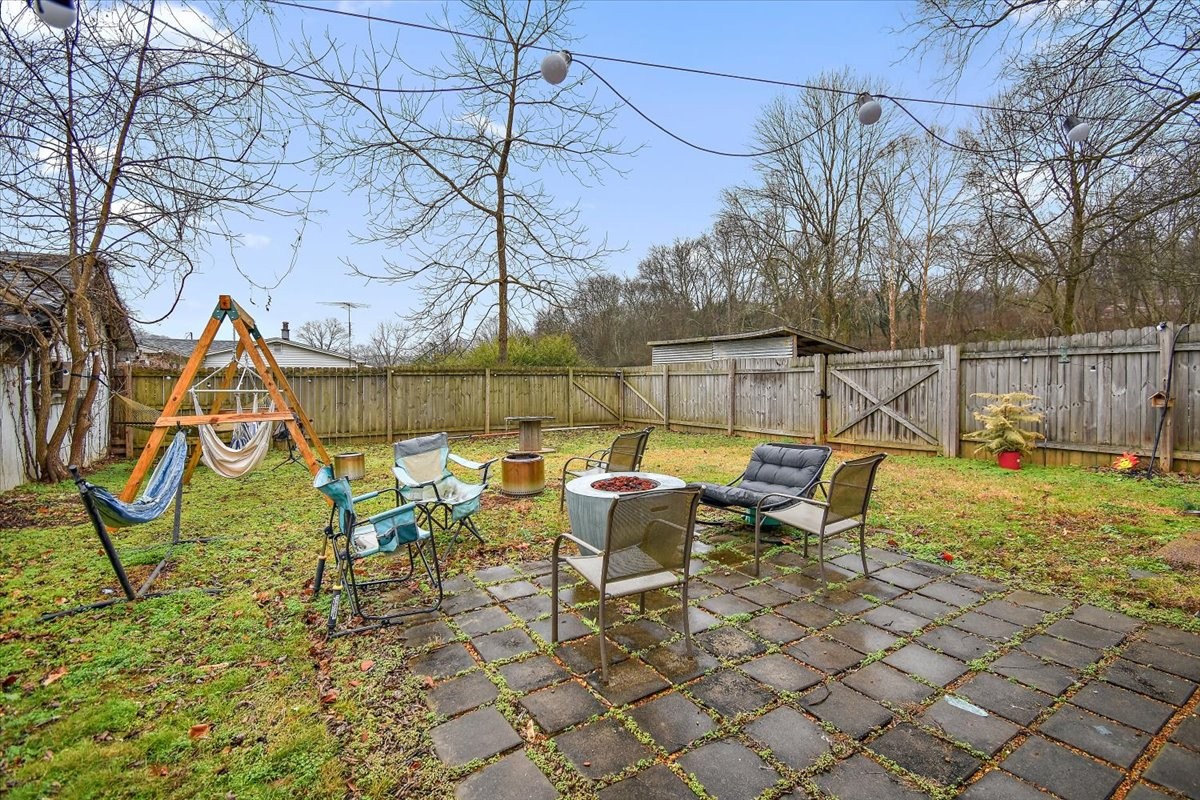 1081 Slaters Creek Road Goodlettsville, TN 37072 - Photo 16 of 22 a view of a lake with tables and chairs