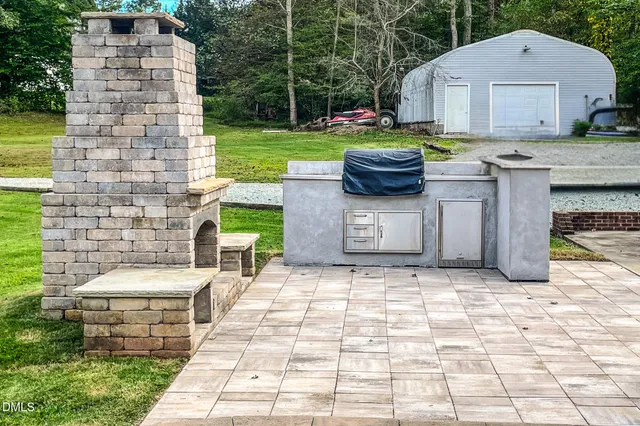 a view of a bedroom with furniture and windows
