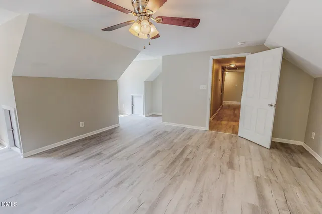 a front view of a house with a yard and porch