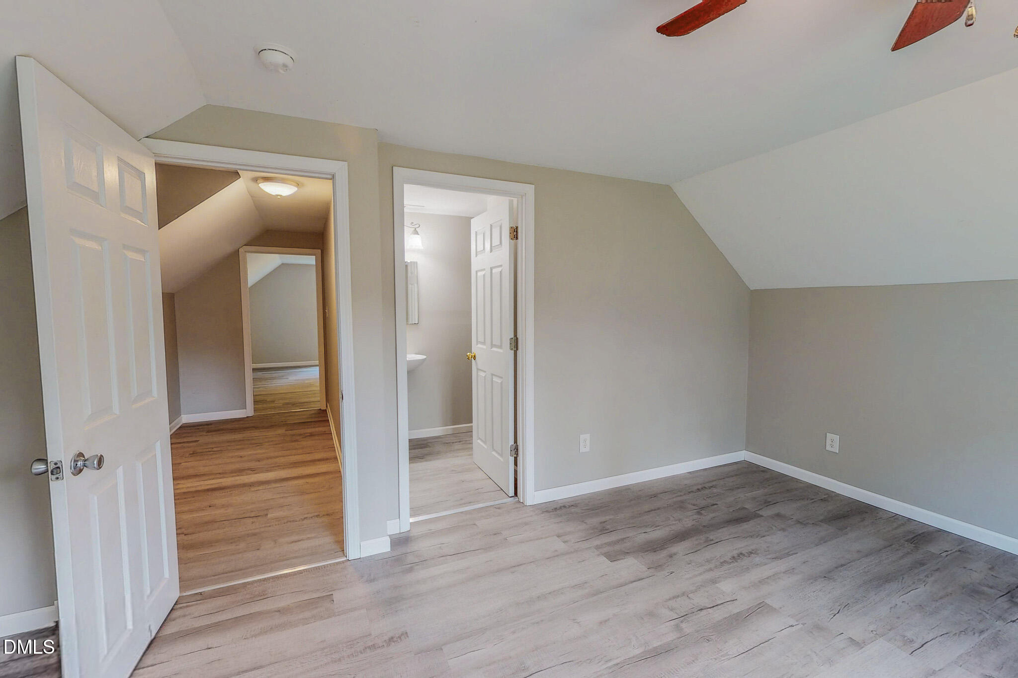 125 Al Gray Road Timberlake, NC 27583 - Photo 54 of 61 wooden floor in a hall with an entryway and a livingroom