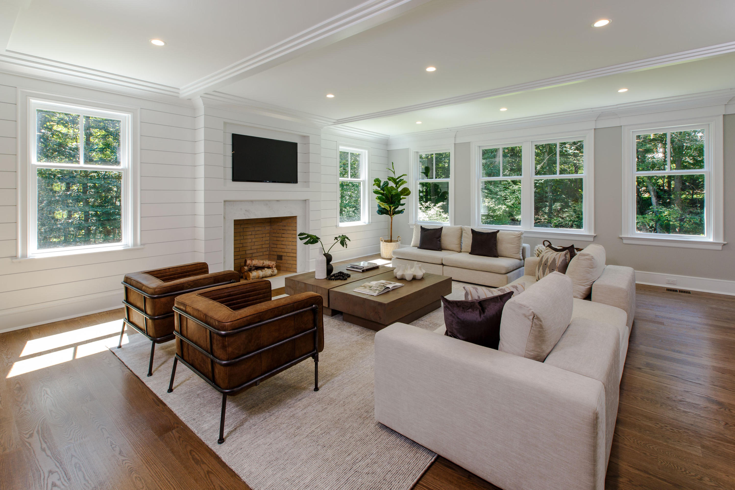 72 Deepwood Road Darien, CT 06820 - Photo 11 of 39 a living room with furniture and a fireplace
