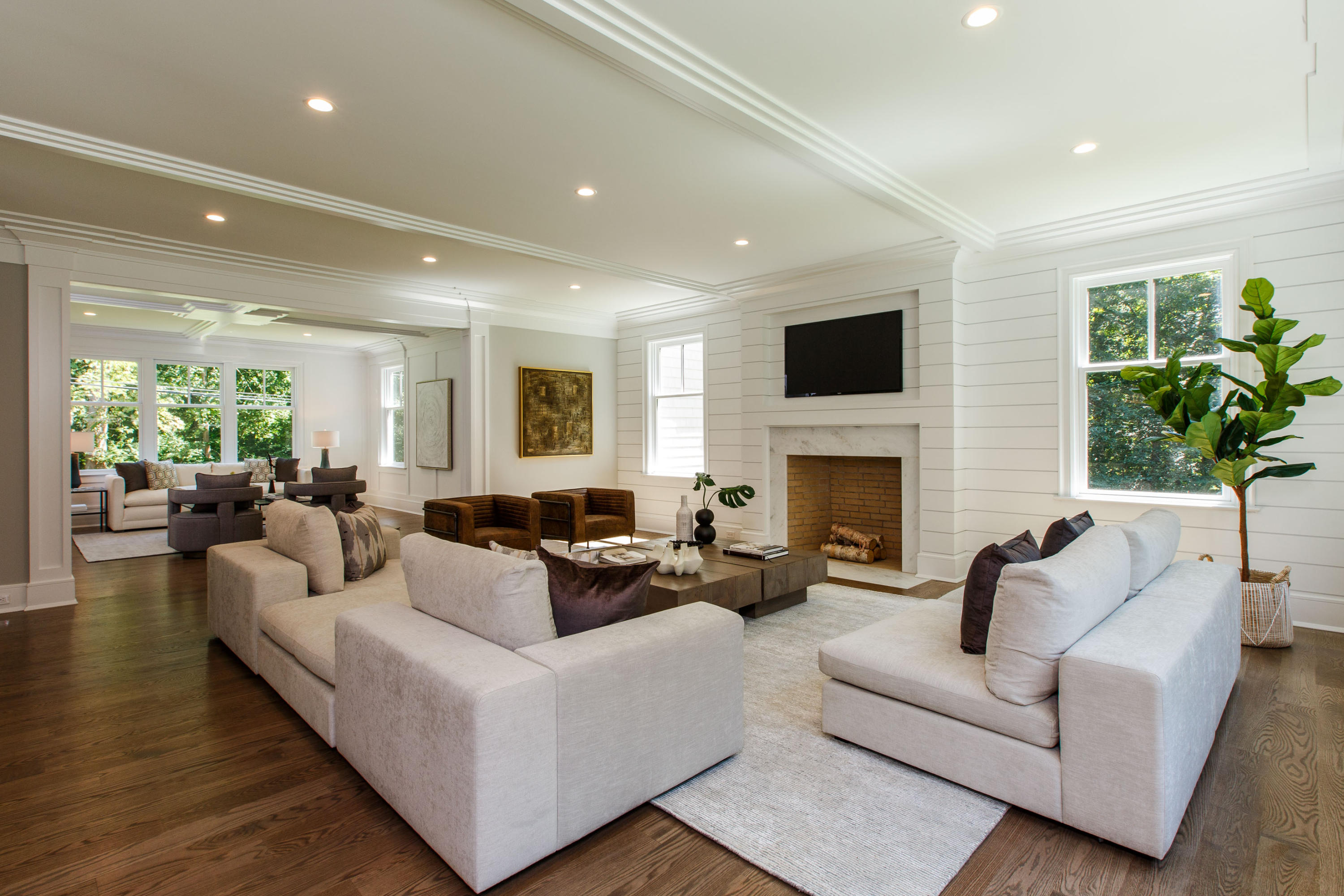 72 Deepwood Road Darien, CT 06820 - Photo 13 of 39 a living room with furniture a flat screen tv and a fireplace