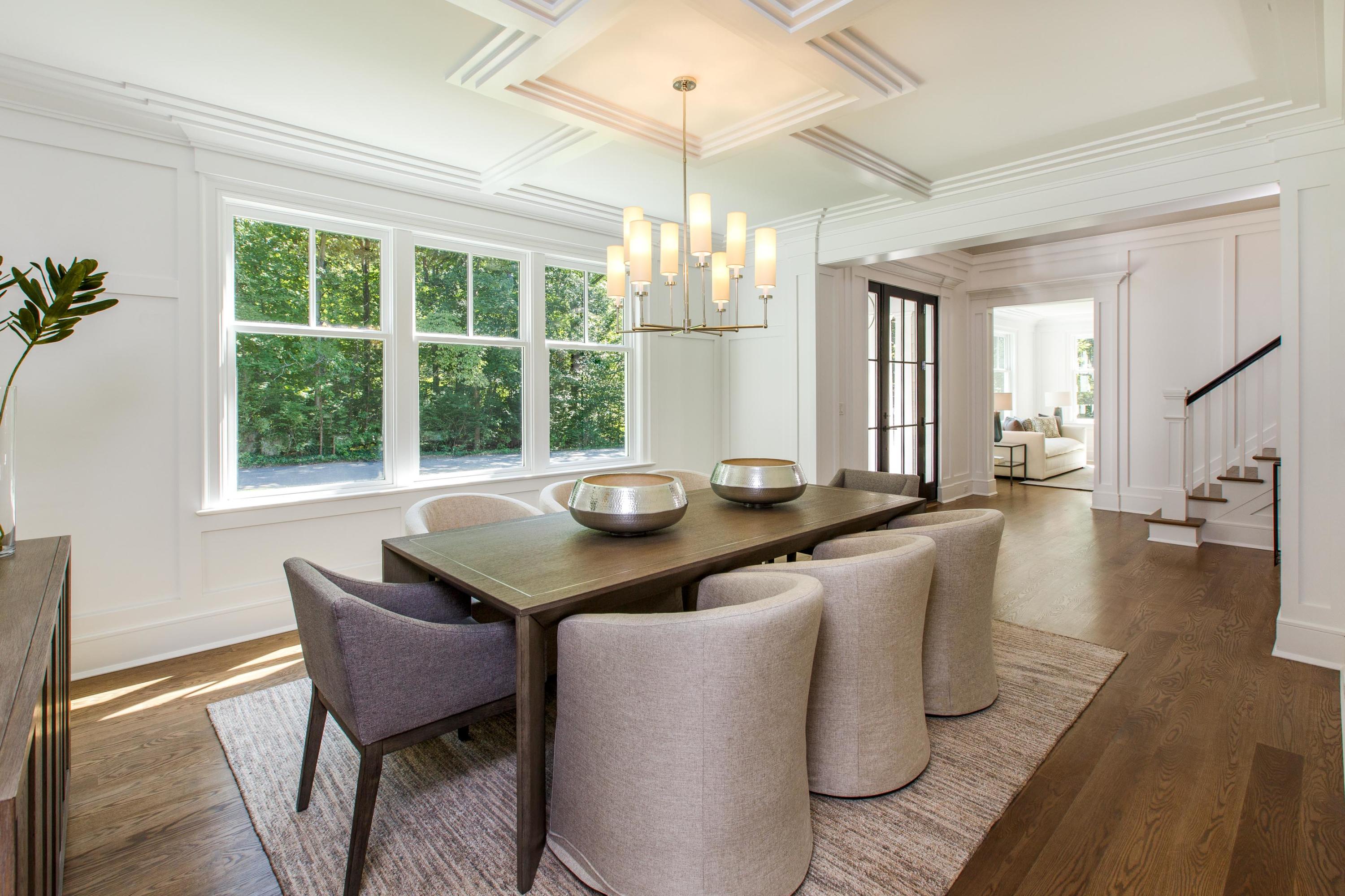 72 Deepwood Road Darien, CT 06820 - Photo 15 of 39 a dining room with a large window table and chairs