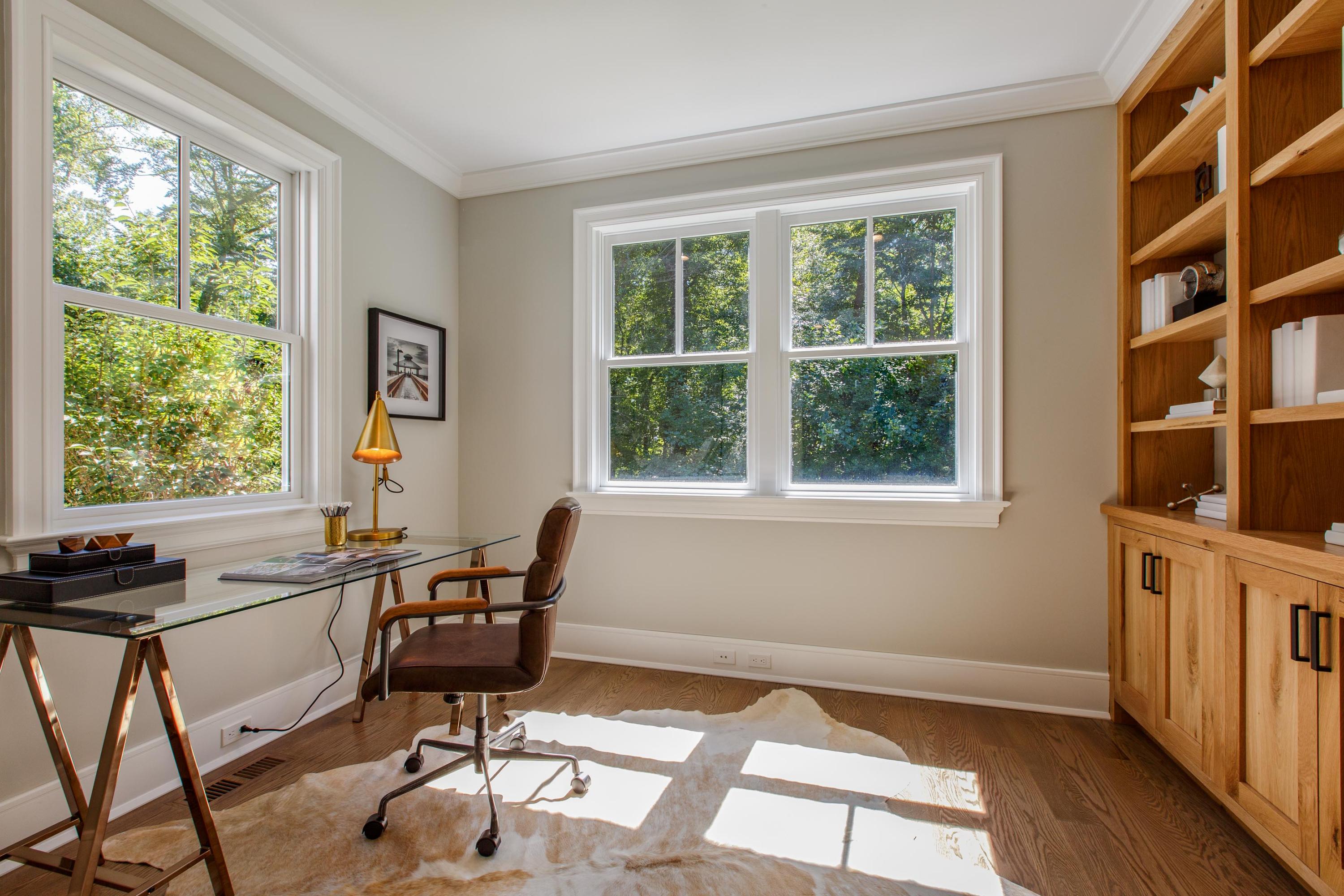 72 Deepwood Road Darien, CT 06820 - Photo 22 of 39 a view of a workspace with furniture and a window